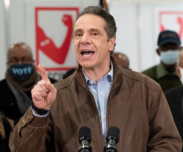 andrew cuomo points at crowd while speaking