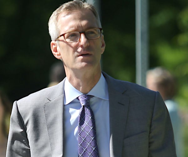 ted wheeler looks up on a bright sunny day