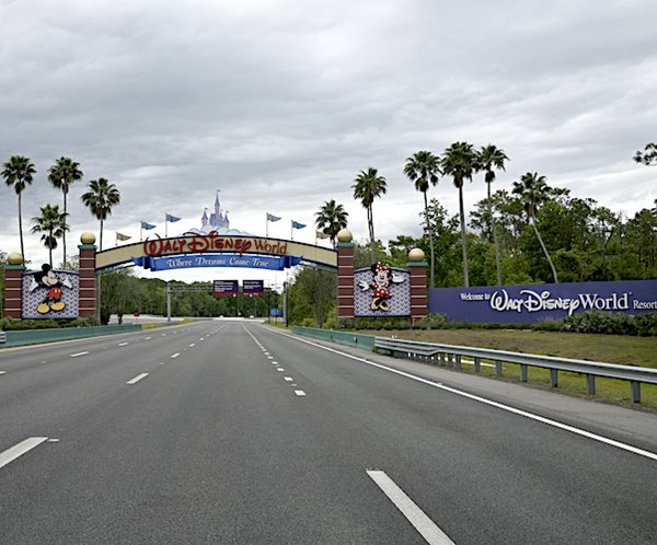 a disneyw world sign entering from the highway