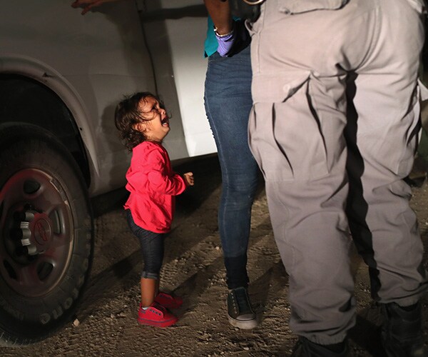 Photo of Toddler Crying as Border Patrol Searches Mom Goes Viral