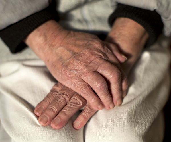 hands of an elderly woman. 