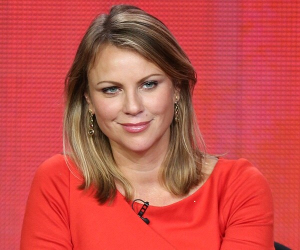 lara logan on a panel on stage