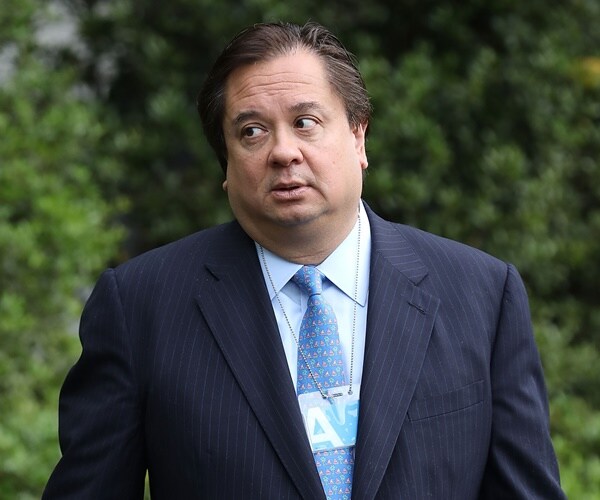 george conway walks across the white house lawn