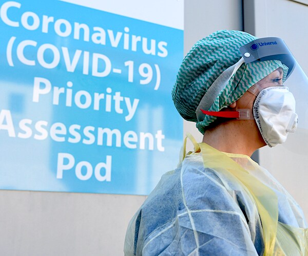 Nurse during a demonstration of the Coronavirus pod and COVID-19 virus testing procedures