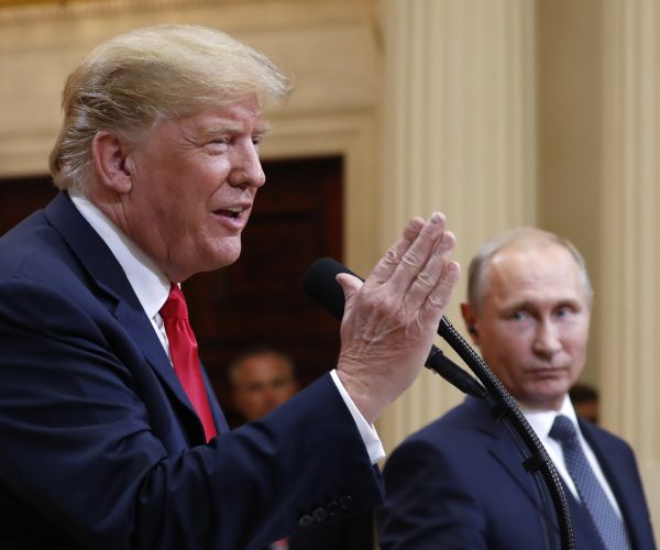 president donald trump speaks with russian president vladimir putin during a press conference