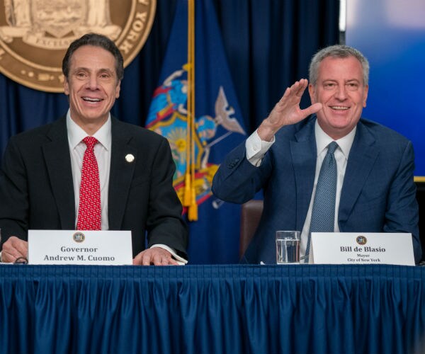 new york governor andrew cuomo and new york city mayor bill de blasio at a news conference