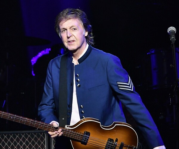 paul mccartney performs onstage