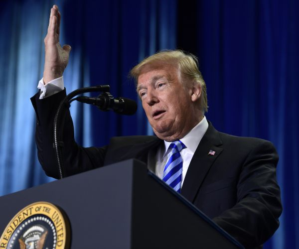 president donald trump talks to reporters. 