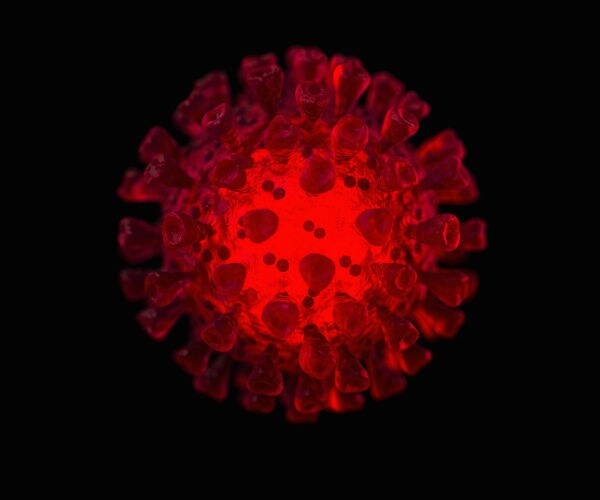 a coronavirus graphic is shown in red on a black background