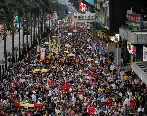 Thousands Take to Hong Kong Streets to Protest New Extradition Laws