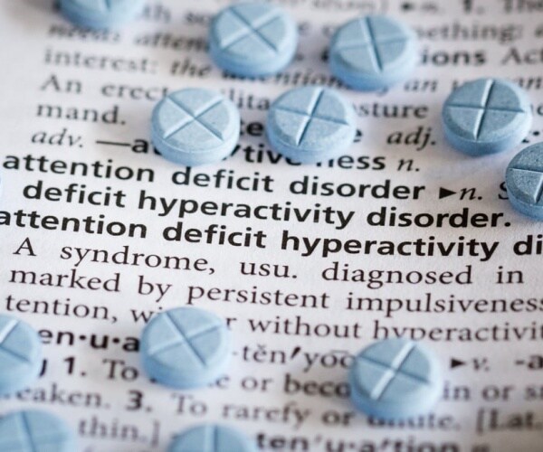 attention-deficit hyperactivity disorder (ADHD) entry in medical text an medication tablets