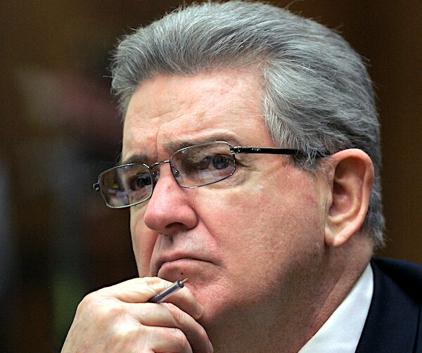 Former FBI agent John Connolly listens to the testimony during his 2008 trial in Miami