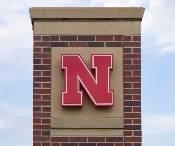 university of nebraska logo on brick pillar