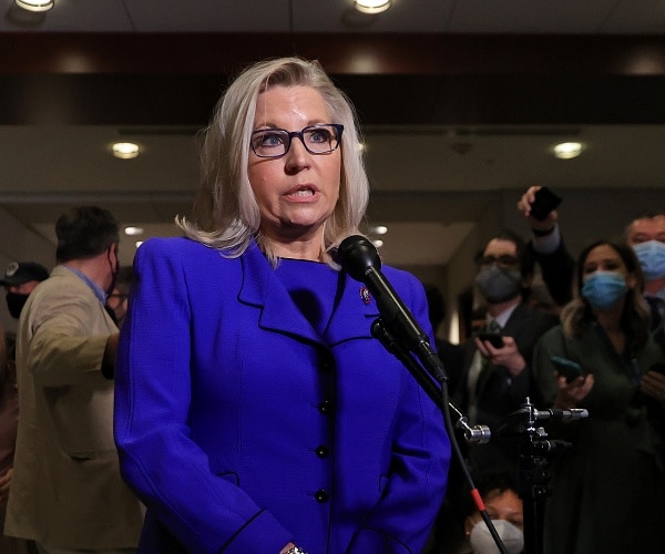 liz cheney speaks to reporters in capitol