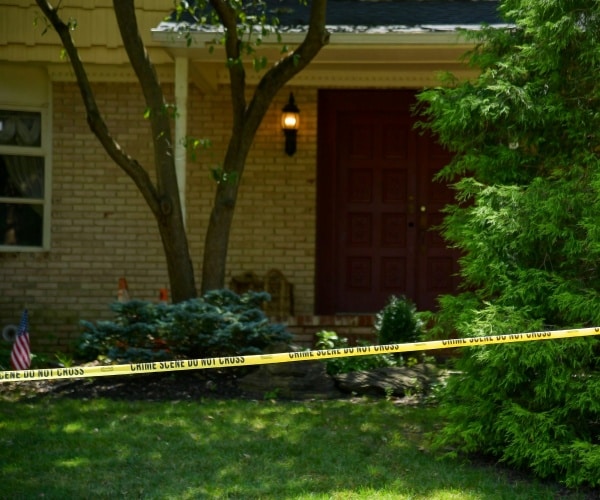 salas' home after the shooting with yellow police tape