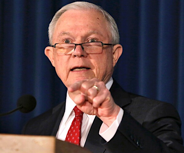 jeff sessions gestures during a news conference