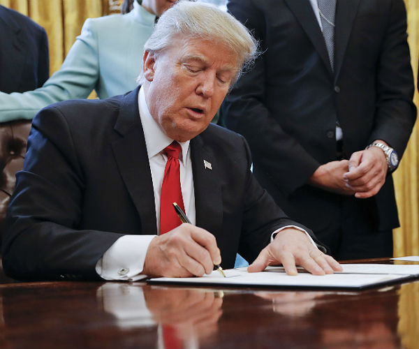 Trump, Fond of Signing Executive Orders, Awaits More Pens