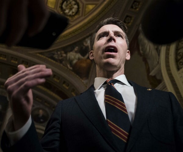 Sen. Josh Hawley speaks to the press in the U.S. Capitol 