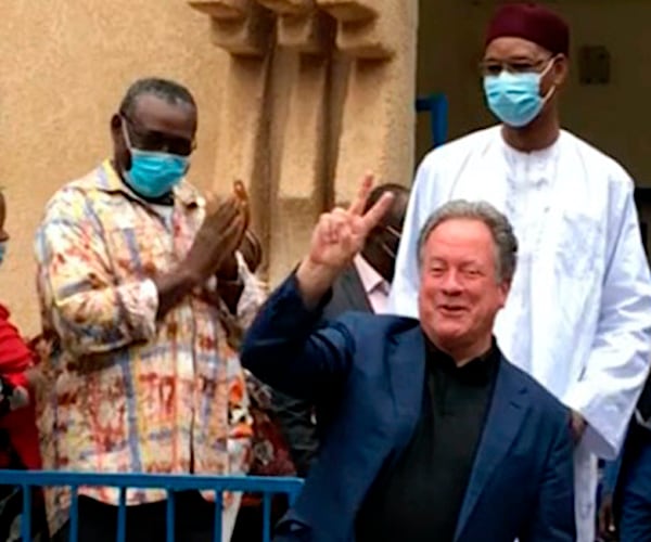 The World Food Bank Program's David Beasley, appointed by President Donald Trump in 2017, flashes a peace sign