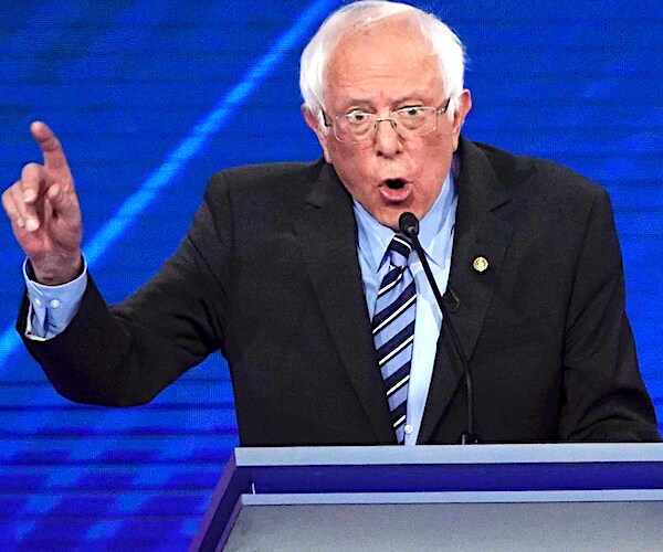 bernie sanders exults during a democratic presidential primary debate