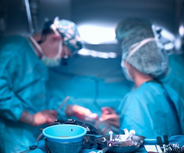 surgeons in operating room