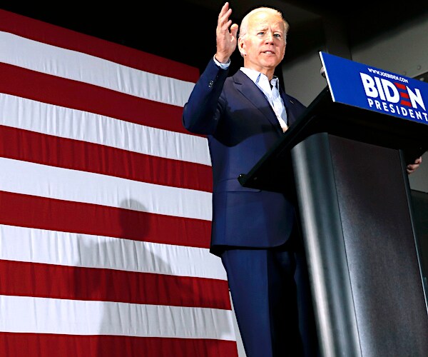 joe biden speaks during a democratic presidential primary