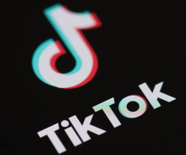 the tiktok logo on a smartphone