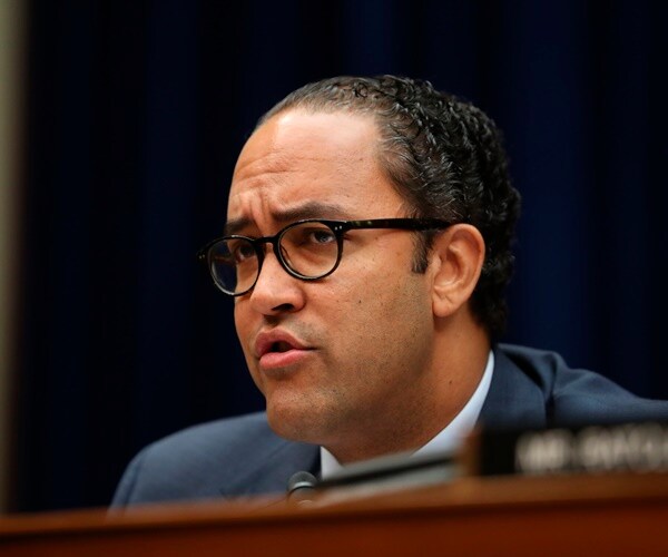 rep. will hurd sits at the bench at a committee meeting and questions a witness