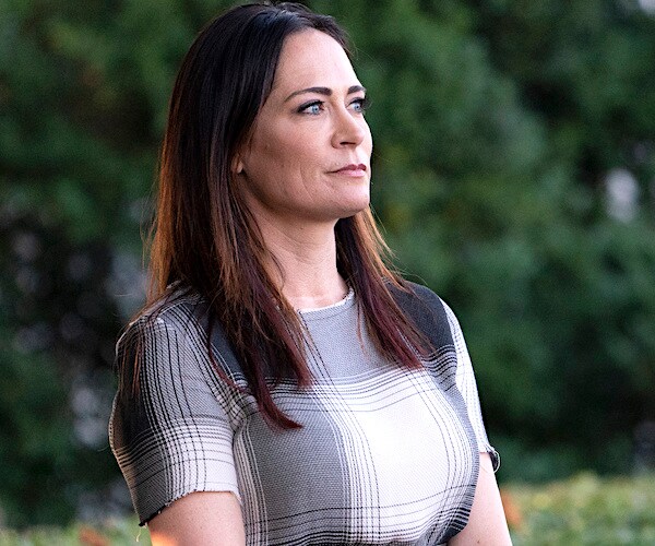 press secretary Stephanie Grisham looks to the right while photographed outside the white house