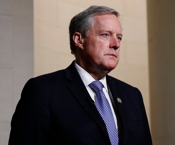 mark meadows listens to others speak