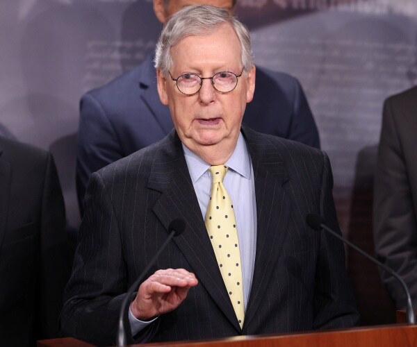 mitch mcconnell gestures while speaking