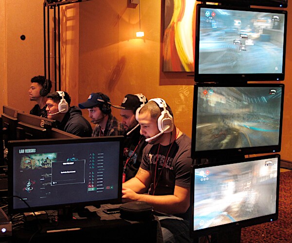 video game players compete against one another in an esports tournament at caesars casino in atlantic city.