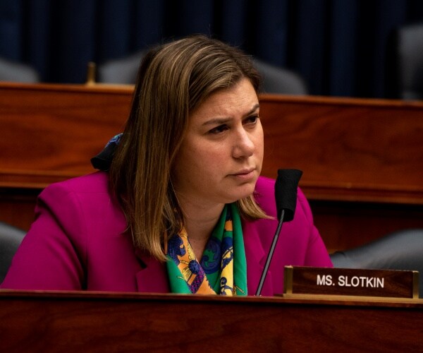 elissa slotkin sits and listens