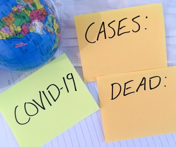 globe, mask, post-it notes that say COVID, Cases, Deaths