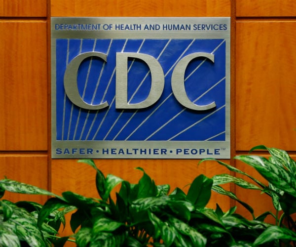 A podium withthe Centers for Disease Control and Prevention logo is shown