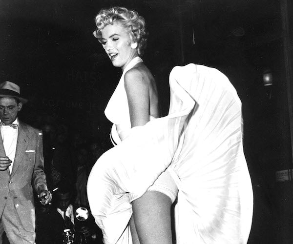 marilyn monroe in the famed skirt blown up by a street vent photo