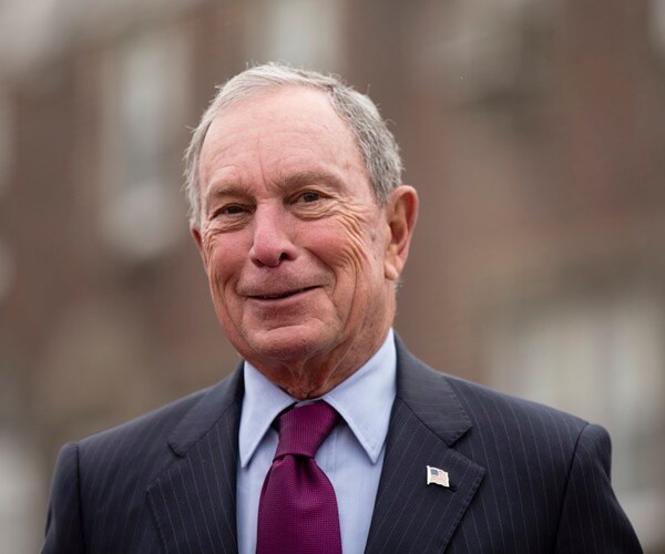 mike bloomberg stands on the streets of new york