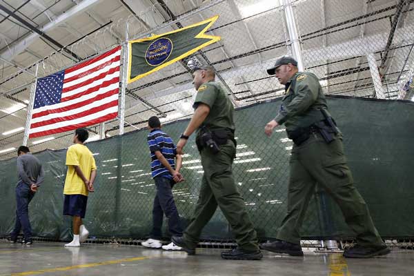 NYT: End 'Immoral' and Costly Detention of Suspected Illegals