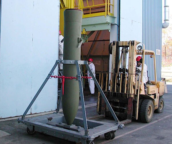 A thermobaric bomb sits on a platform after being completed