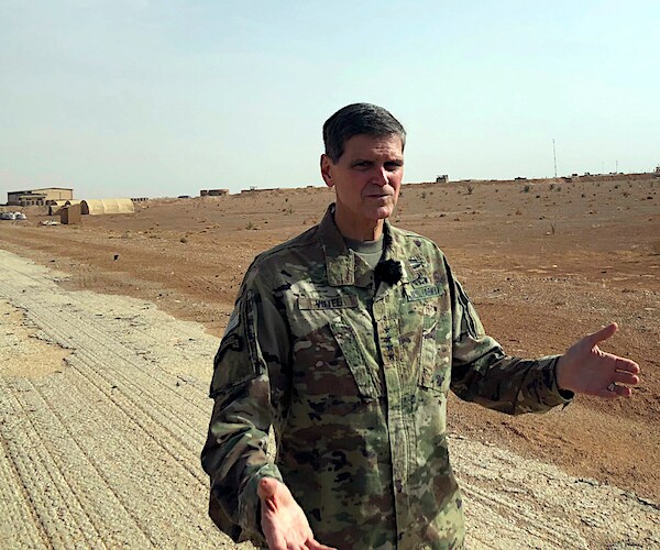 general joseph votel speaks to reporters in front of the al-tanf military outpost in southern syria