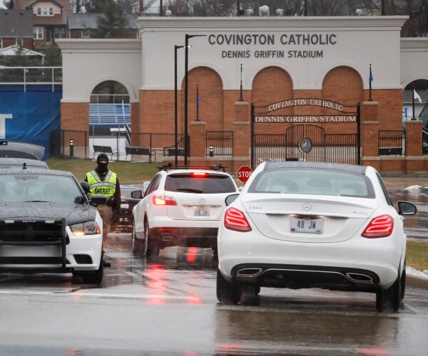 cars in the parking lot of covington catholic high school