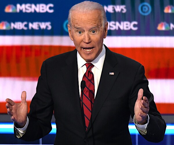 joe biden exults during a democratic presidential primary debate