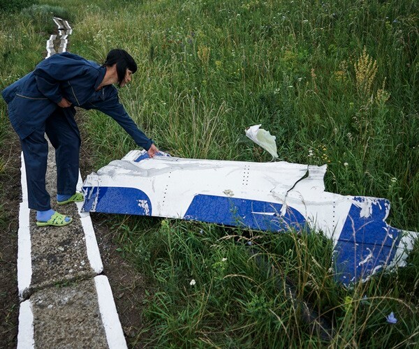 MH17 Probe Finds 'probable' BUK Missile Pieces at Crash site