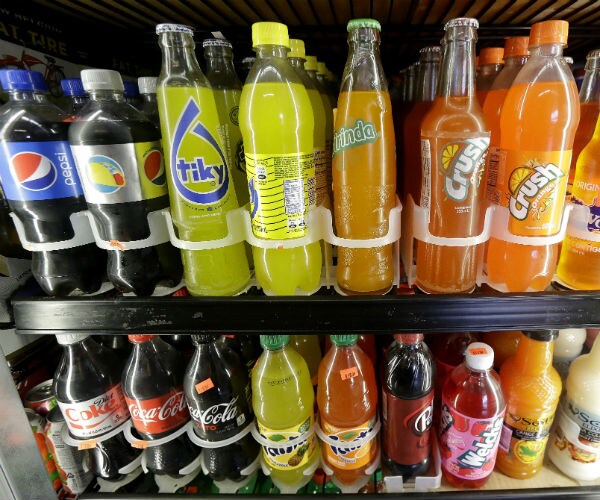 WHO Urges Countries to Raise Taxes on Sugary Drinks