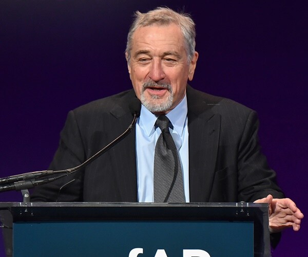 robert de niro speaks at a poducium during a gala in new york