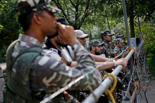 Indian Army Patrols as Masses Support Guru in Rape Case