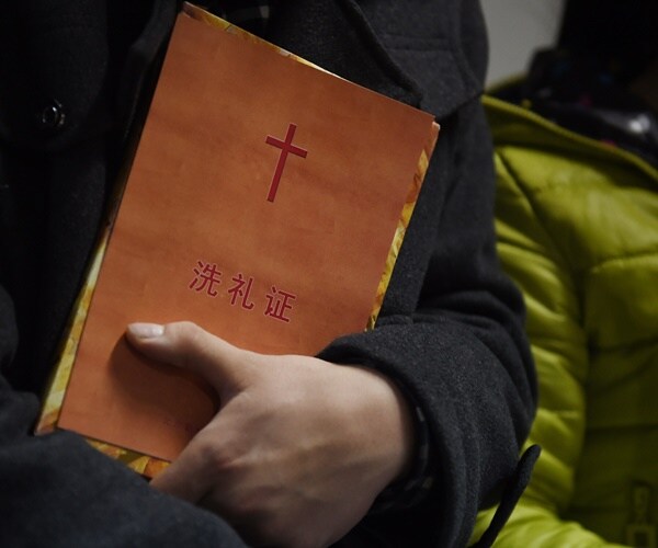 Johnnie Moore: Chinese Bulldoze Church, Burying Alive a Pastor, Wife