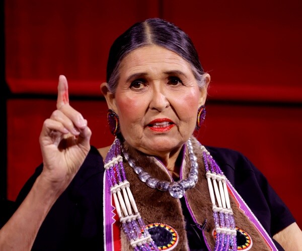 sacheen littlefeather gestures while speaking