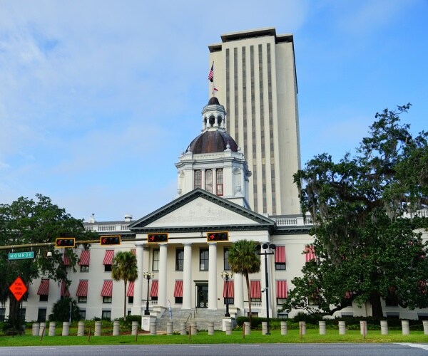 florida state house is shown against a blue sky