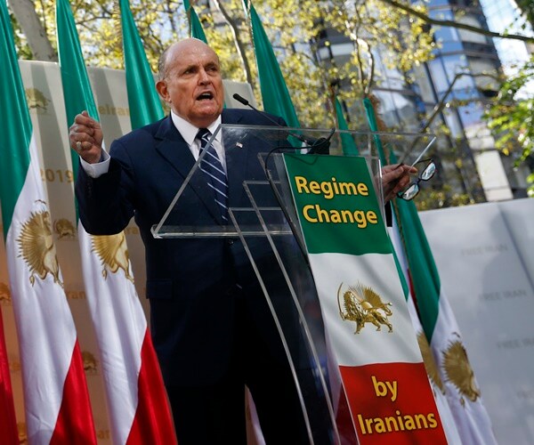 rudy giuliani speaks with a crowd that wants regime change in iran